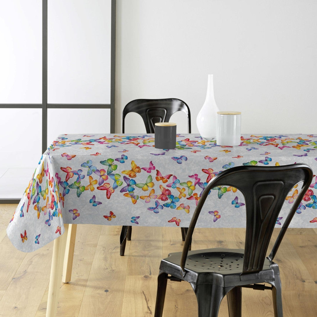 Vaxduk med fjärilar på rad i många färger