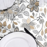 Gloriette - Vaxduk med blommor i grått och sand, närbild