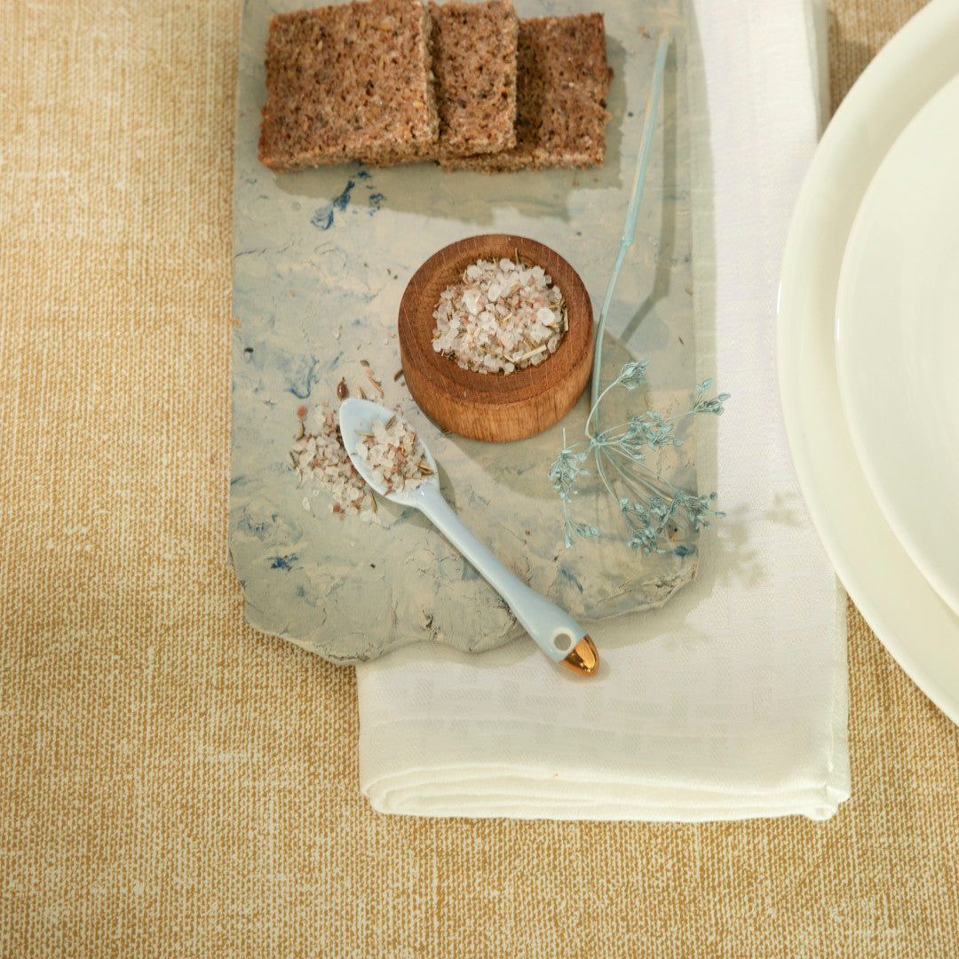 Illusion Demi Gold – Captain Cook vaxduk med linnelook närbild