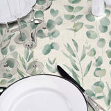 Jodie – Vaxduk med slät linnelook och grönt bladmönster, närbild