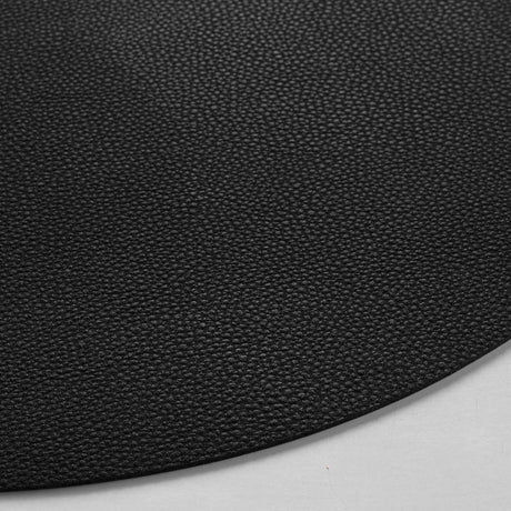 Granis Svart – Rund bordstablett i konstläder Ø 38 cm, vändbar, närbild