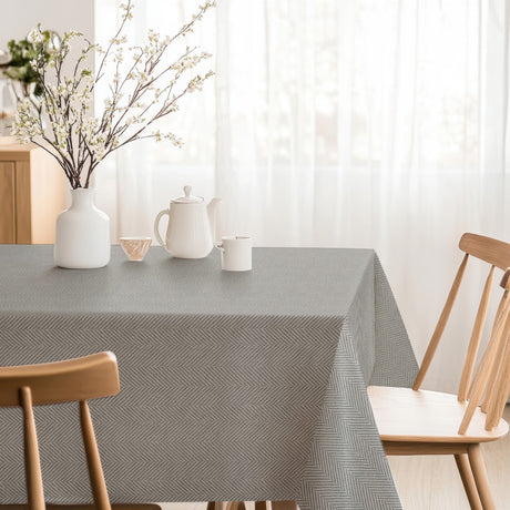 Nagore Gris – textilvaxduk med klassiskt fiskbensmönster hörn