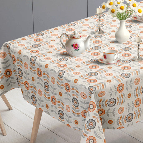Retroblomma – krämfärgad vaxduk med grafiska blommor bordsände