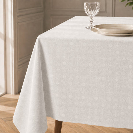 Rivera Blanco – Jacquardvävd textilvaxduk i offwhite 160 cm bred, hörn