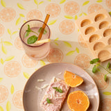 Slice Me Up Nude – Captain Cook vaxduk med grafiskt citrusmönster närbild