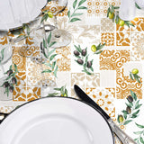 Solanova – Vaxduk med oliver och gyllene kakel, närbild