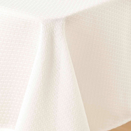 Stella – Damastduk med diskret vävd struktur – 140 x 240 cm, hörn