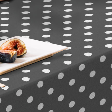 Top Dots Grey – Mörkgrå vaxduk med vita prickar, närbild