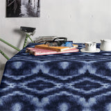 Saura Denim - textilvaxduk med batikliknande design, 140 cm