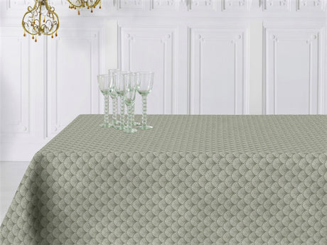 Amigoni Dusty Green - Jacquardvävd textilvaxduk med diskret solfjädersmönster