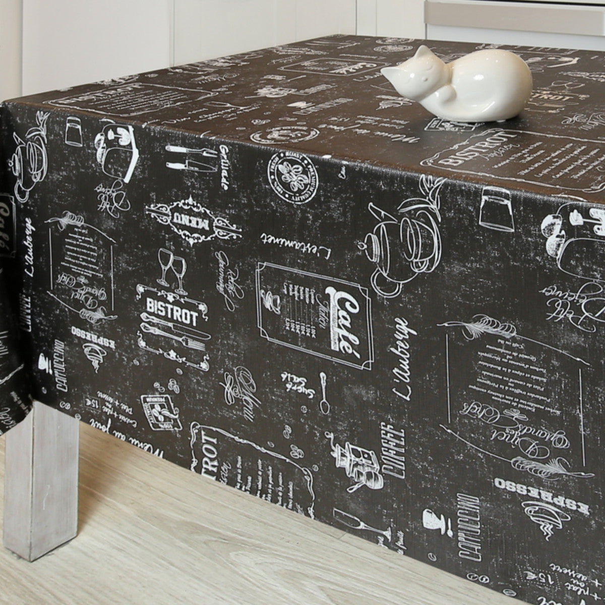 Bistro Svart, vaxduk med café-motiv och präglad yta