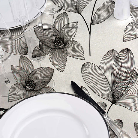 Danela Black Glitter - Kraftig genomskinlig vaxduk med streckblommor och glittereffekt