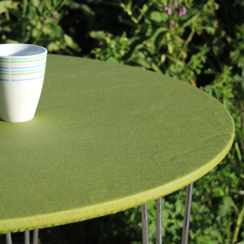 Enfärgad textilvaxduk grön - rund textilvaxduk med resårkant