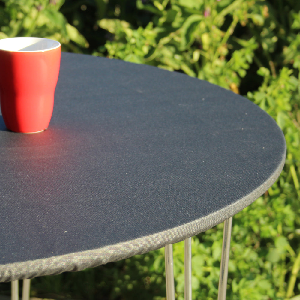 Enfärgad svart textilvaxduk - rund textilvaxduk med resårkant