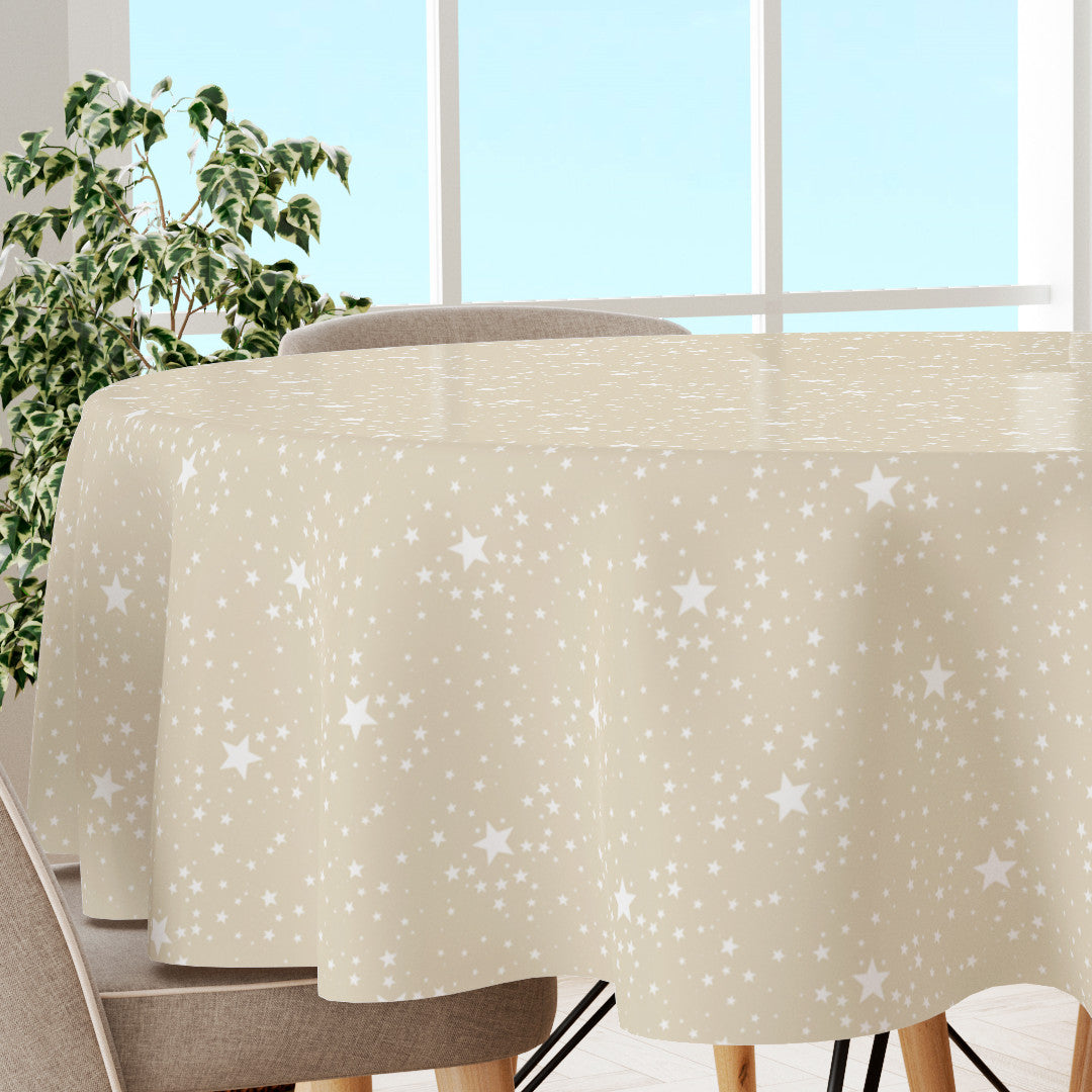 Etoiles, rund julvaxduk med vita stjärnor på ljus beige bakgrund
