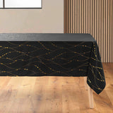Firmament Metallic Print Svart/guld - Svart nyårs-/julduk med guldtryck, 140 x 240 cm