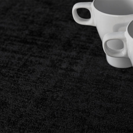 Morillo Luxxus Svart – jacquardvävd textilvaxduk, 140 cm bred