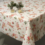 Rudolf Julefest julduk med stearinljus på bordet.