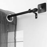 Sarita Svart – Justerbar gardinstång 120–210 cm, upphängning