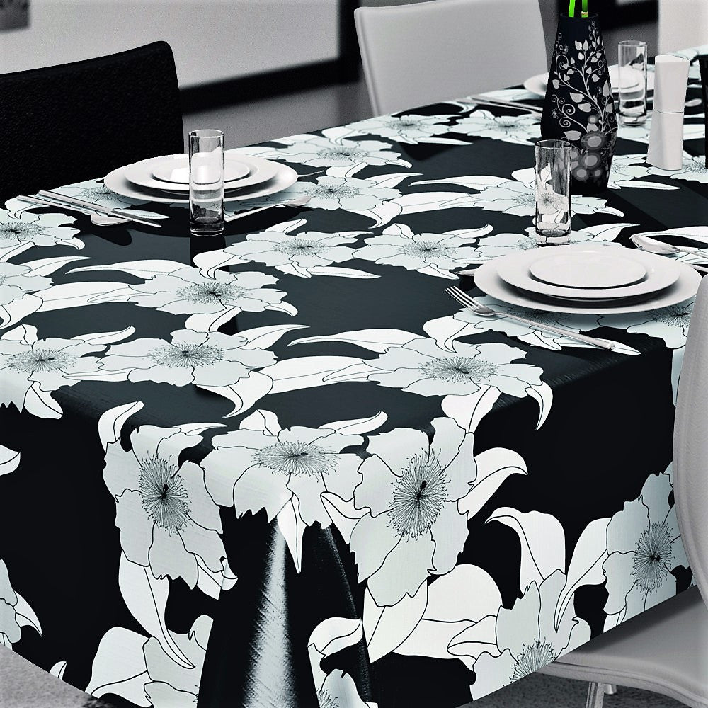 Vibi svart, vaxduk med streckblommor på bordet